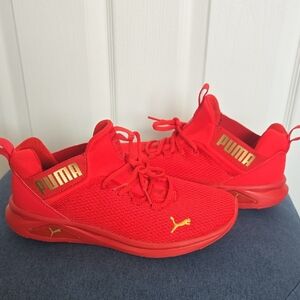 Puma Bold Red Athletic Shoes with Gold Highlights